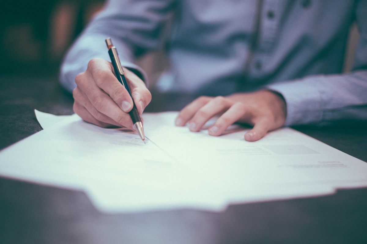 An advocate signing a completed instrument